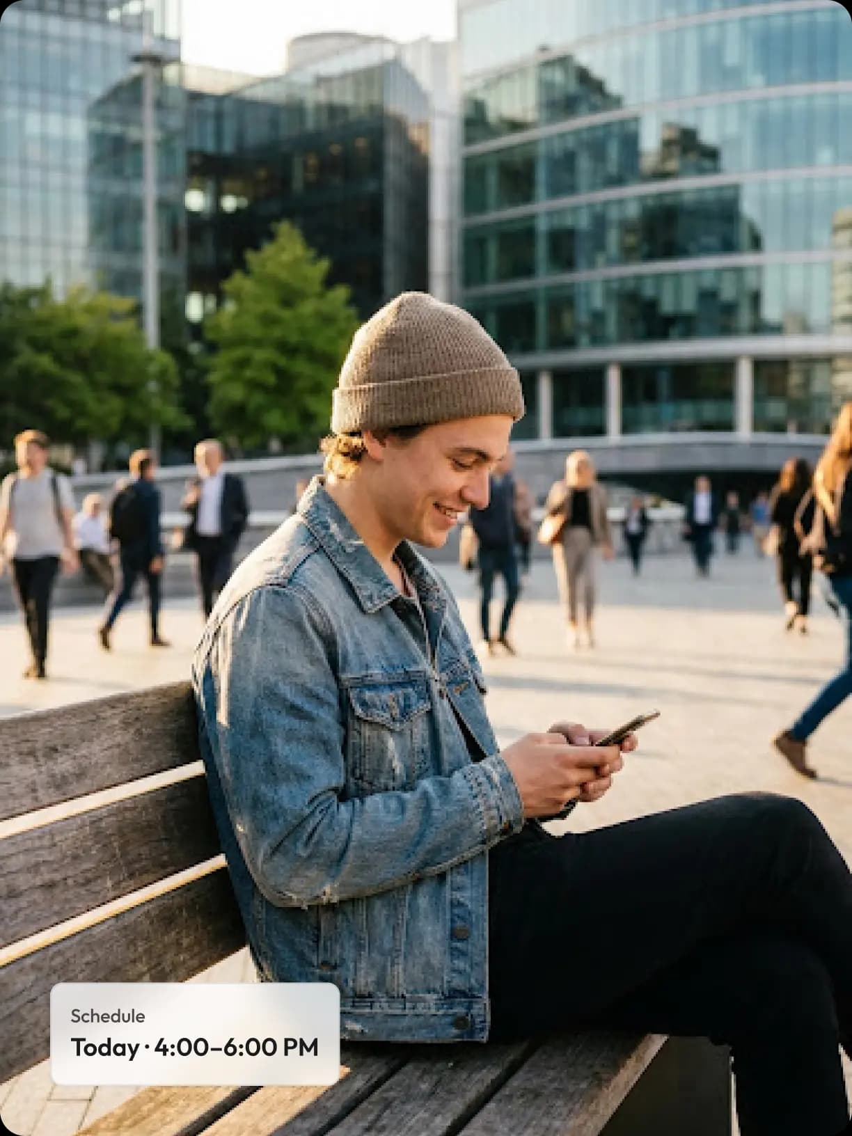 A promoter checking a nearby campaign on their phone in the city
